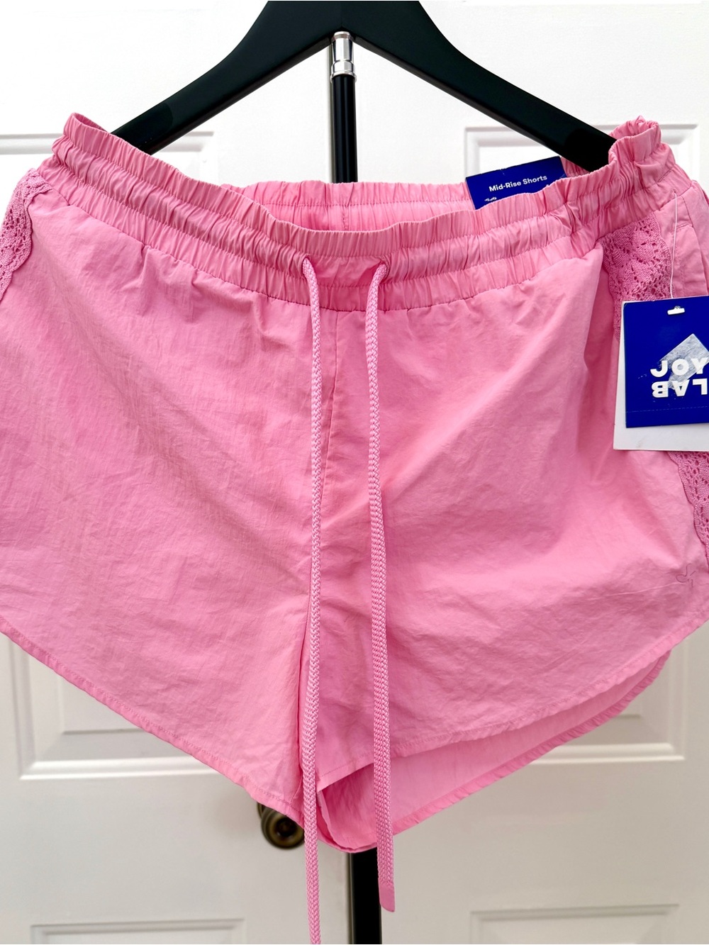 JoyLab Pink Athletic Shorts with embroidered accents on the sides